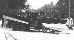 1930 Linn tractor with Frink plows